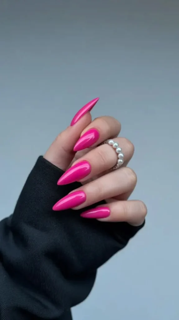 18 Pink Chrome Nail Ideas That Are So Good, You’ll Stare At Your Hands All Day 7 Fuchsia Stiletto Power Nails