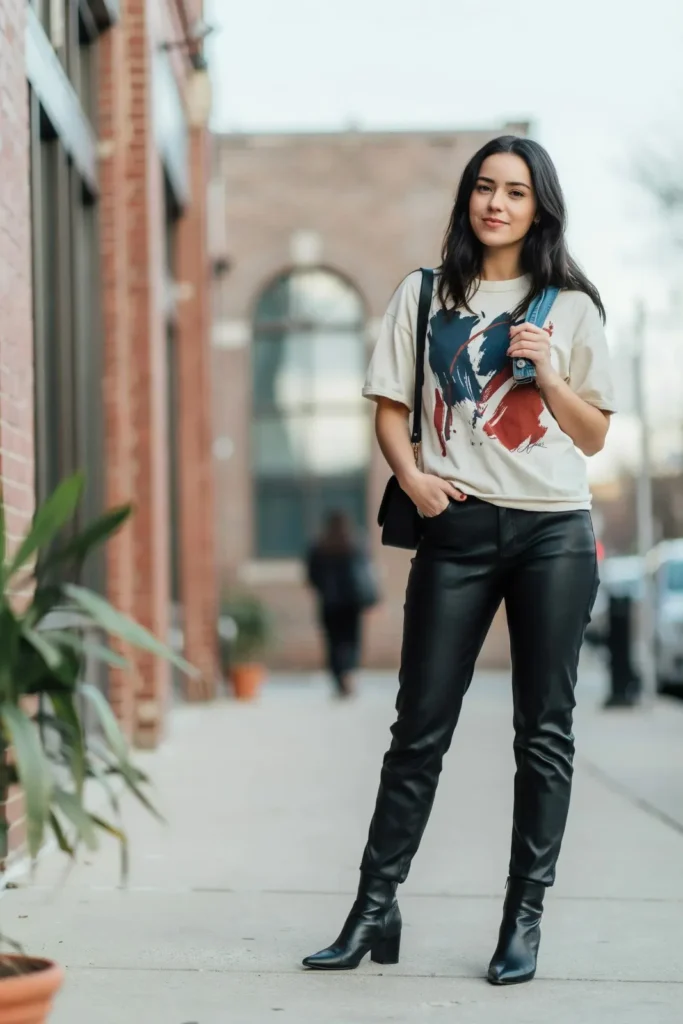 18 Outfit Ideas for Women That Make Getting Dressed Way More Fun 4 Graphic Tee Leather Pants