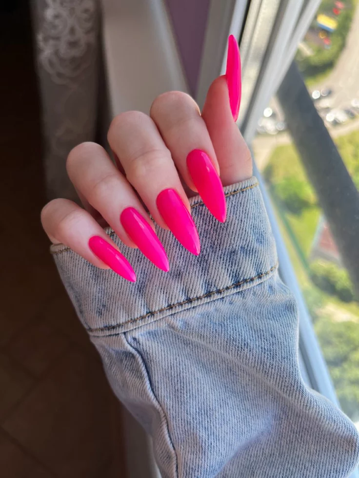 17 Pink Almond Nail Ideas That Are So Pretty, Your Mani Will Break the Group Chat 3 Hot Magenta Power Stiletto Energy