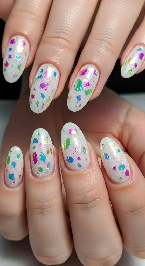17 Pink Almond Nail Ideas That Are So Pretty, Your Mani Will Break the Group Chat 11 Iridescent Opal Flakes