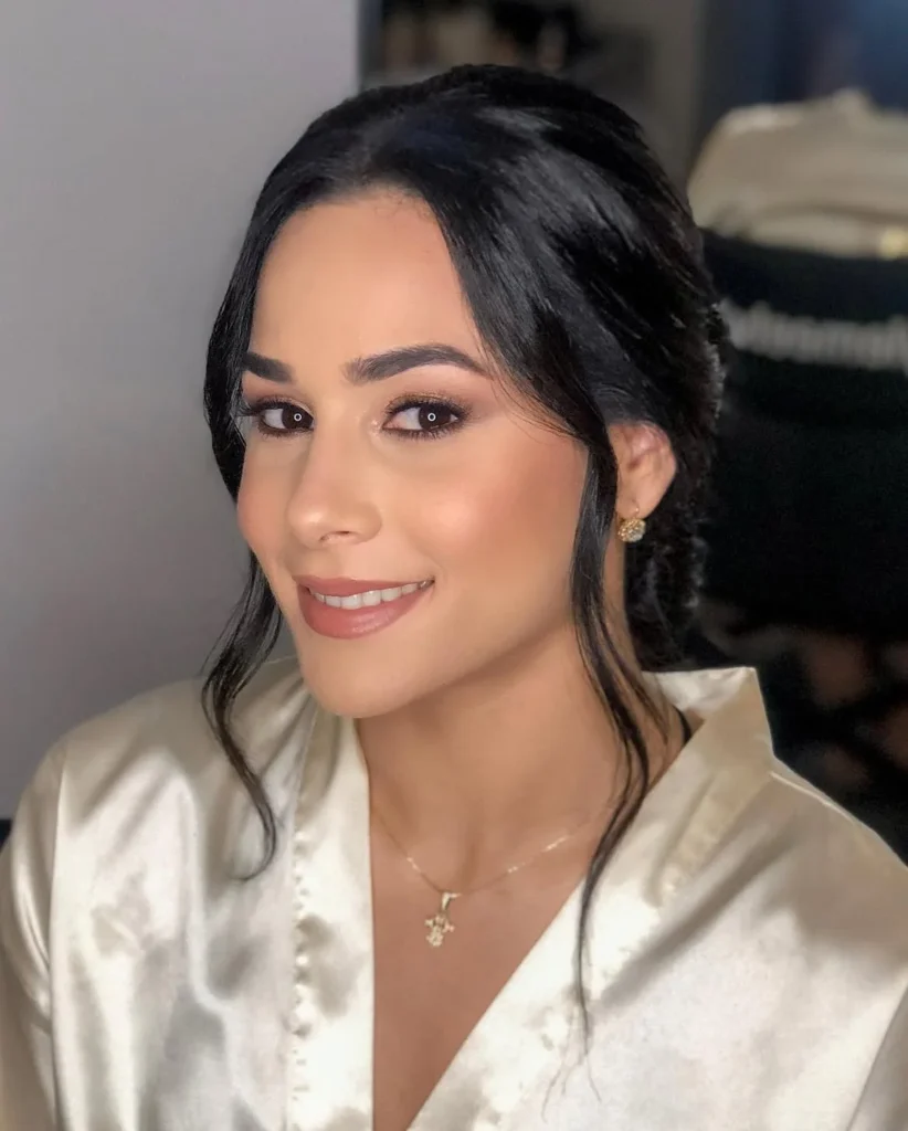 19 Formal Hairstyles for Long Hair That'll Have Everyone Asking "Who Does Your Hair?!" 3 Low Chignon with a Center Part
