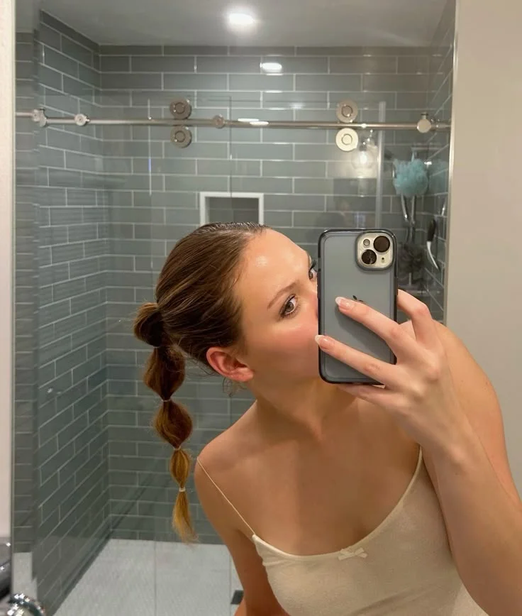 15 Cute Hairstyles for Medium Hair That Look Way Harder Than They Are 5 Mini Bubble Ponytail