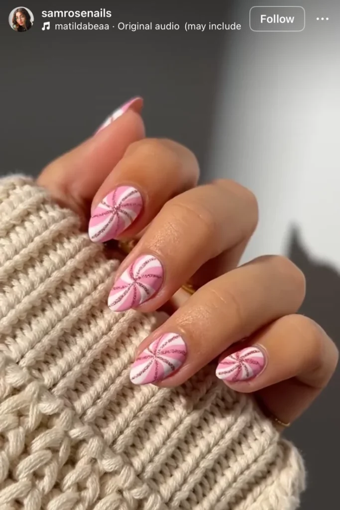 20 Pink Christmas Nail Ideas That Are Way More Fun Than Red & Green (Trust Me) 5 Pastel Pink Candy Cane Swirls