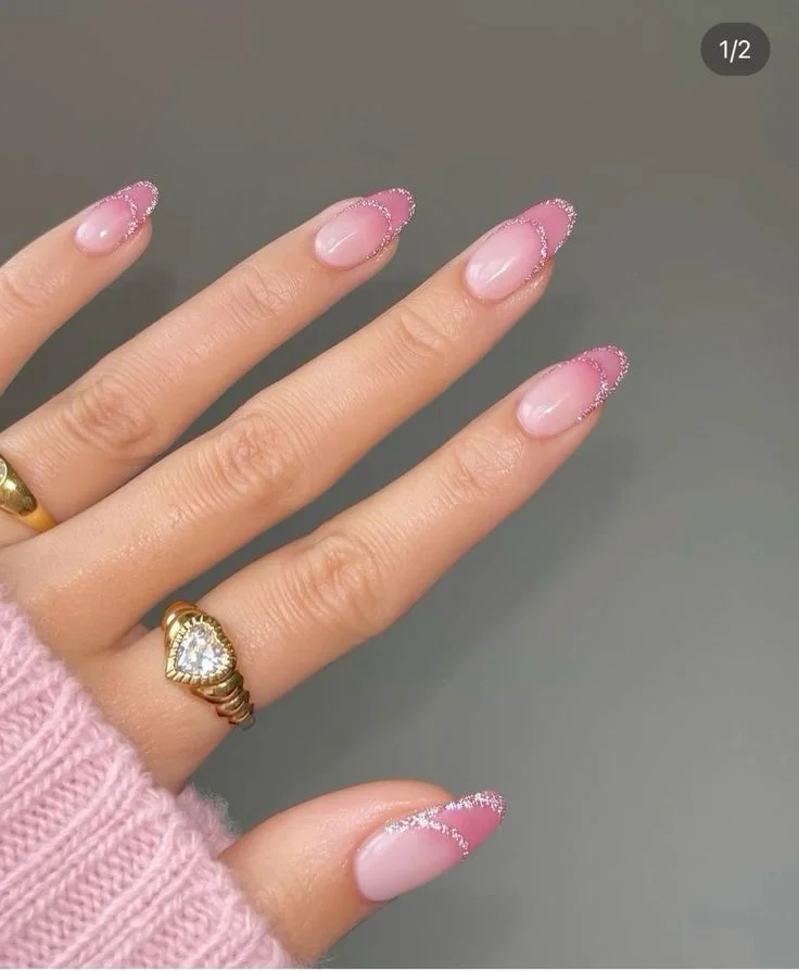 17 Pink Almond Nail Ideas That Are So Pretty, Your Mani Will Break the Group Chat 9 Pink Ombre Rhinestone Crescent