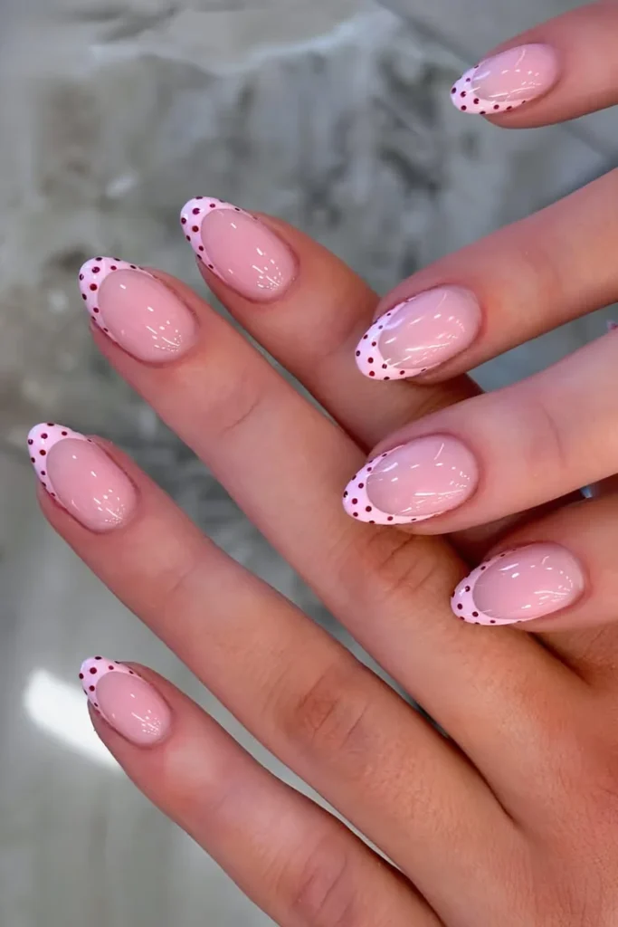 20 Pink Christmas Nail Ideas That Are Way More Fun Than Red & Green (Trust Me) 7 Pink White Polka Dots