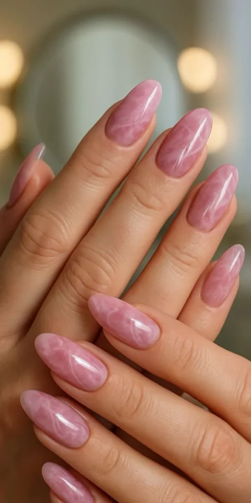 17 Pink Almond Nail Ideas That Are So Pretty, Your Mani Will Break the Group Chat 15 Rose Quartz Crackle Marble