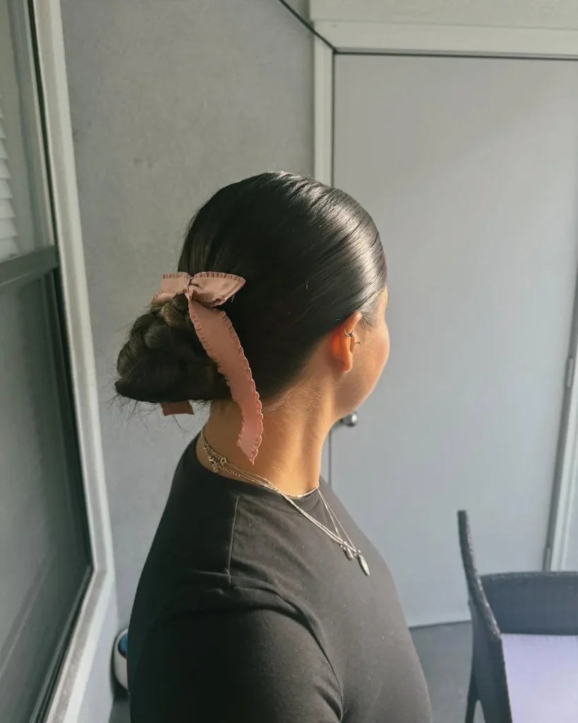 19 Formal Hairstyles for Long Hair That'll Have Everyone Asking "Who Does Your Hair?!" 10 Sleek Slicked Back Bun