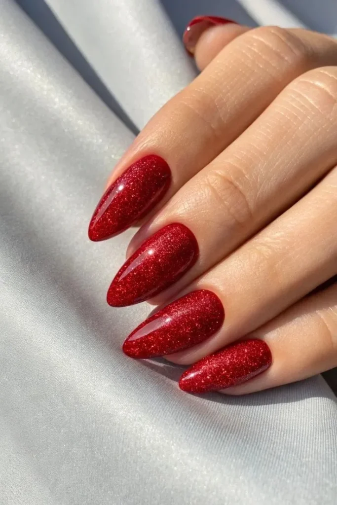 A Little Holiday Glam: 16 Red Christmas Nails That Feel Chic and Festive 7 Sparkling Red Glitter Nails
