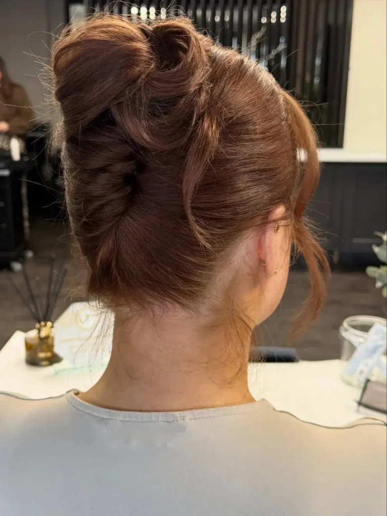 19 Formal Hairstyles for Long Hair That'll Have Everyone Asking "Who Does Your Hair?!" 2 The Classic French Twist