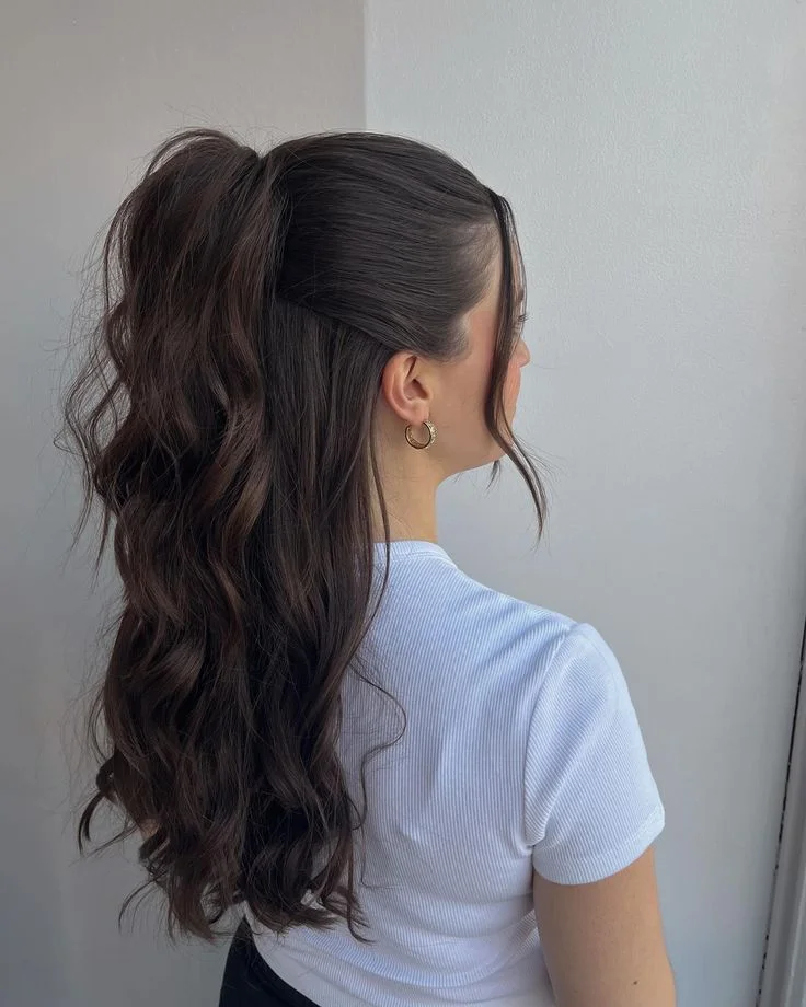 15 Cute Hairstyles for Medium Hair That Look Way Harder Than They Are 9 The Half Up High Ponytail