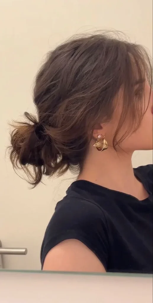15 Cute Hairstyles for Medium Hair That Look Way Harder Than They Are 7 The Messy Low Bun