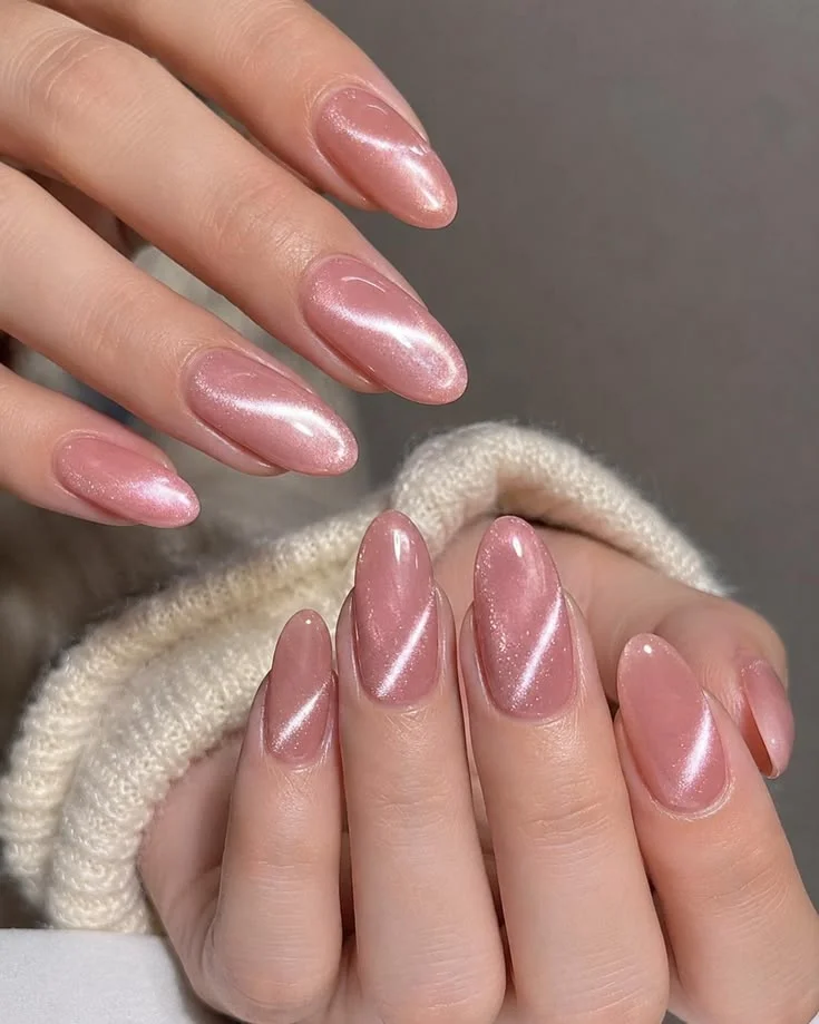 17 Pink Almond Nail Ideas That Are So Pretty, Your Mani Will Break the Group Chat 8 Velvet Crush Pink Cat Eye