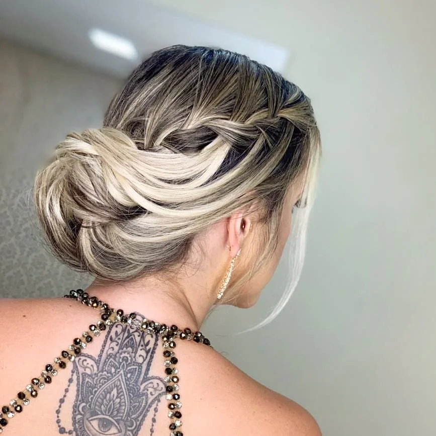 19 Formal Hairstyles for Long Hair That'll Have Everyone Asking "Who Does Your Hair?!" 11 Waterfall Braid into a Low Bun