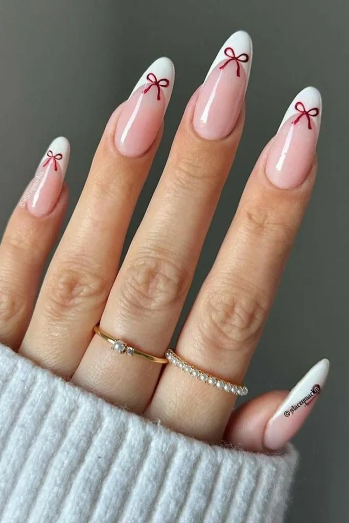 Holiday Nails Made Easy: 17 Simple Christmas Nails That Still Feel Special 12 White French Tips with Tiny Red Bows