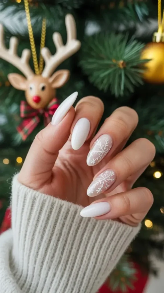 Make Your Holiday Mani Feel Magical With These 15 Christmas Nail Ideas 3 White Snowflake chirstmas Nail Art