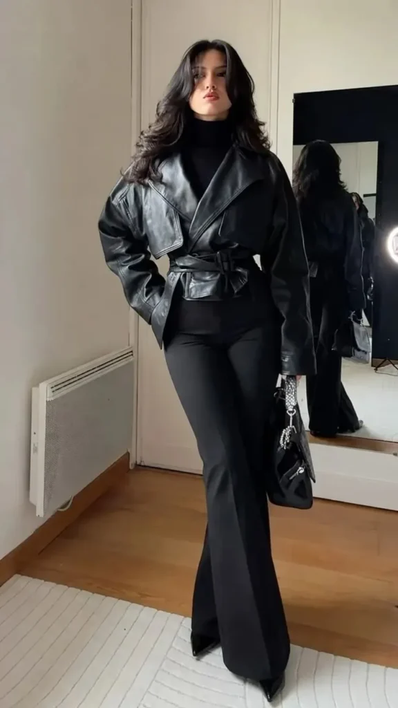 One Jacket, So Many Moods: 15 Leather Jacket Fall Outfits 11 Belted Leather Jacket With Flared Knit Pants