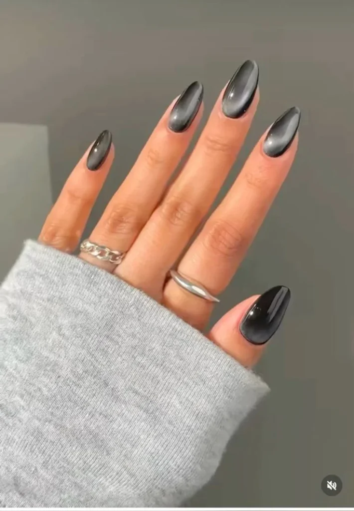 Fall Gets a Little More Magical With These 14 Fall Cat Eye Nails 5 Black Cat Eye Nails With Silver Glow