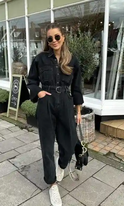 Your Fall Wardrobe Just Got Cooler: 14 Edgy Fall Outfits with Serious Attitude 13 Black Denim Jumpsuit with Statement Accessories