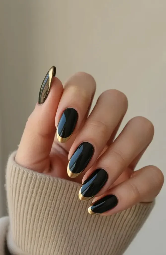 16 Fall Coffin Nails That Make Autumn Manicures Feel Extra Stylish 8 Black and Gold Fall Nails 1