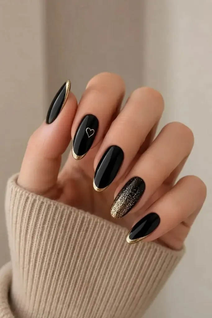 16 Cute Fall Nails That Make Your Cozy Season Look 10x Better 10 Black and Gold Fall Nails