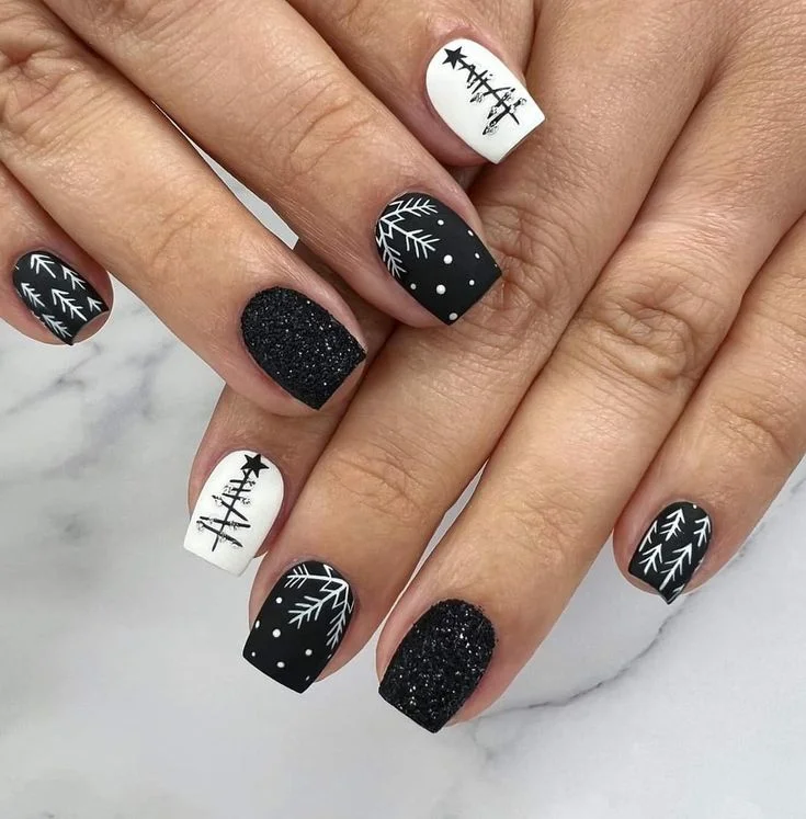 Dark, Festive, and Seriously Chic: 16 Black Christmas Nails for a Stylish Holiday Look 15 Black and White Sweater Nails