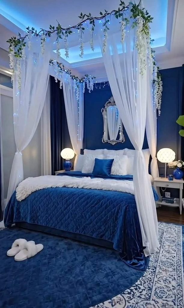 18 Blue Bedroom Ideas That Are Giving “Main Character Energy” Right Now 15 Blue Canopy Bed Elegance