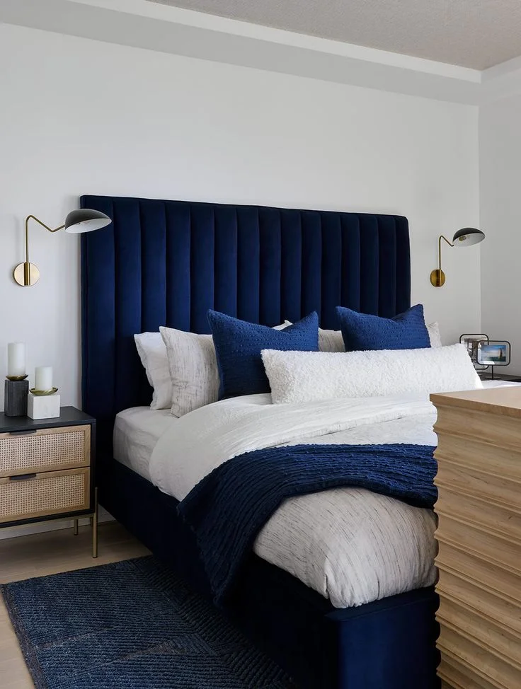 18 Blue Bedroom Ideas That Are Giving “Main Character Energy” Right Now 3 Blue Velvet Headboard Drama