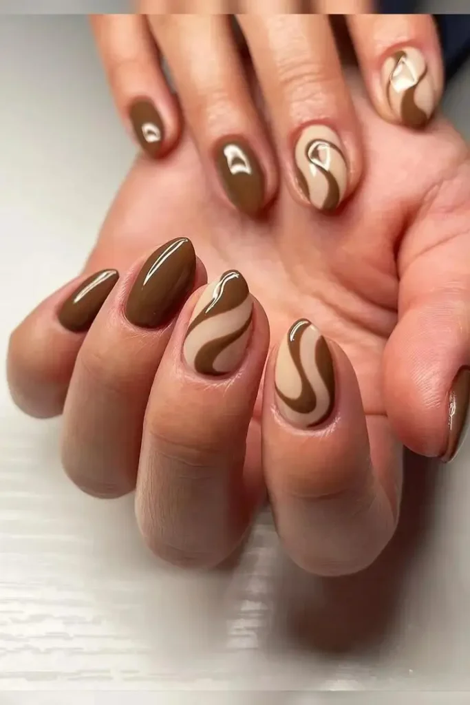 17 Brown Fall Nails That'll Make You Ditch Your Basic Nude Polish Forever 15 Brown and Cream Swirl Nails