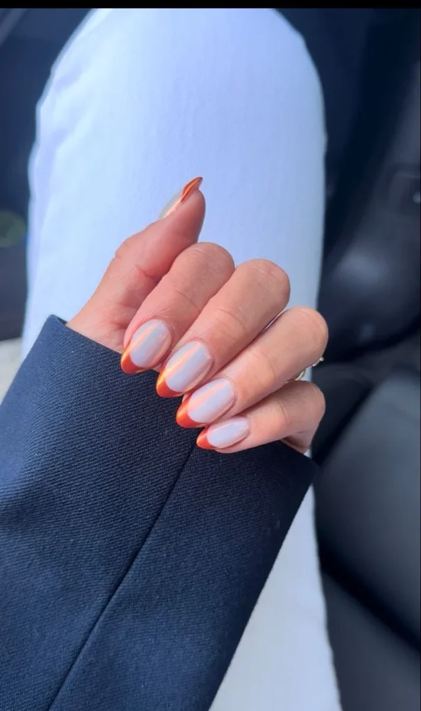 13 Fall Aesthetic Nails That Make Every Autumn Outfit Feel More Put Together 4 Burnt Orange Micro French Nails