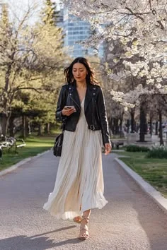 One Jacket, So Many Moods: 15 Leather Jacket Fall Outfits 5 Collarless Leather Jacket With a Pleated Dress