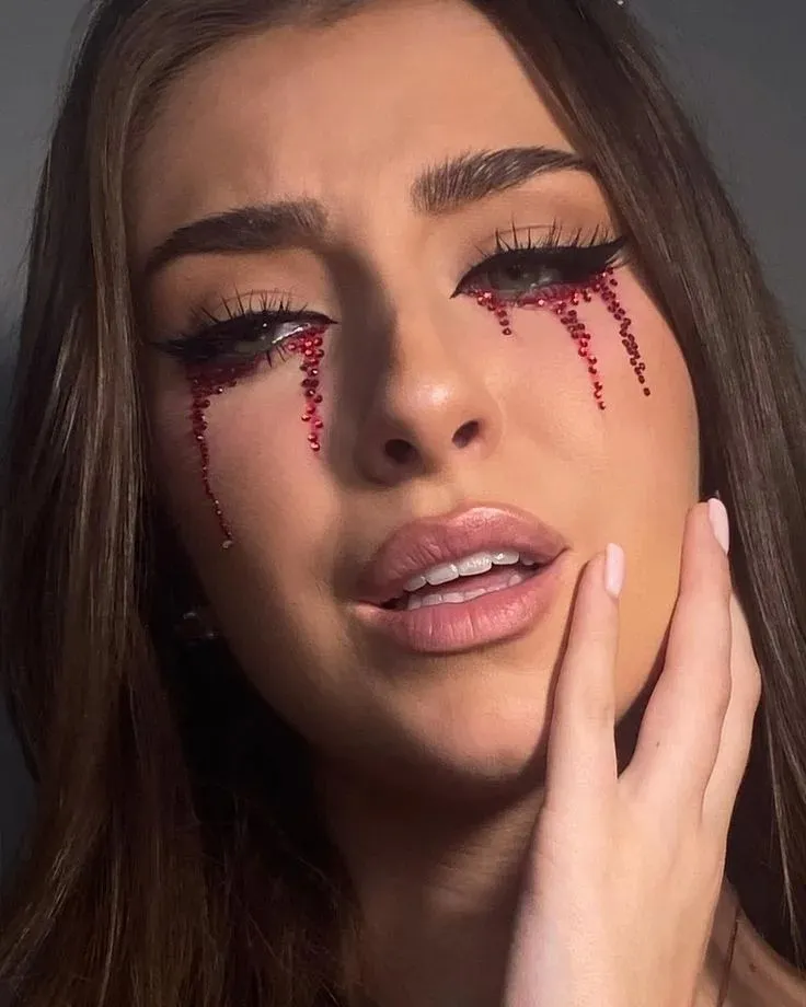 16 Halloween Makeup Looks That Turn a Simple Outfit Into a Whole Costume 5 Crystal Tears Makeup