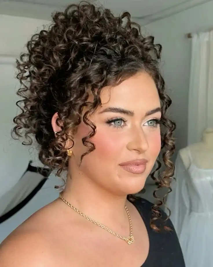 The Bridal Lookbook: 18 Wedding Hairstyles with Veil That Feel Truly Special 11 Curly Updo for Natural Hair