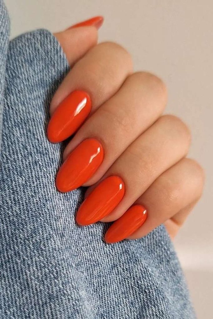 13 Fall Orange Nails That Make Autumn Feel Extra Cozy 7 Dark Orange Almond Nails