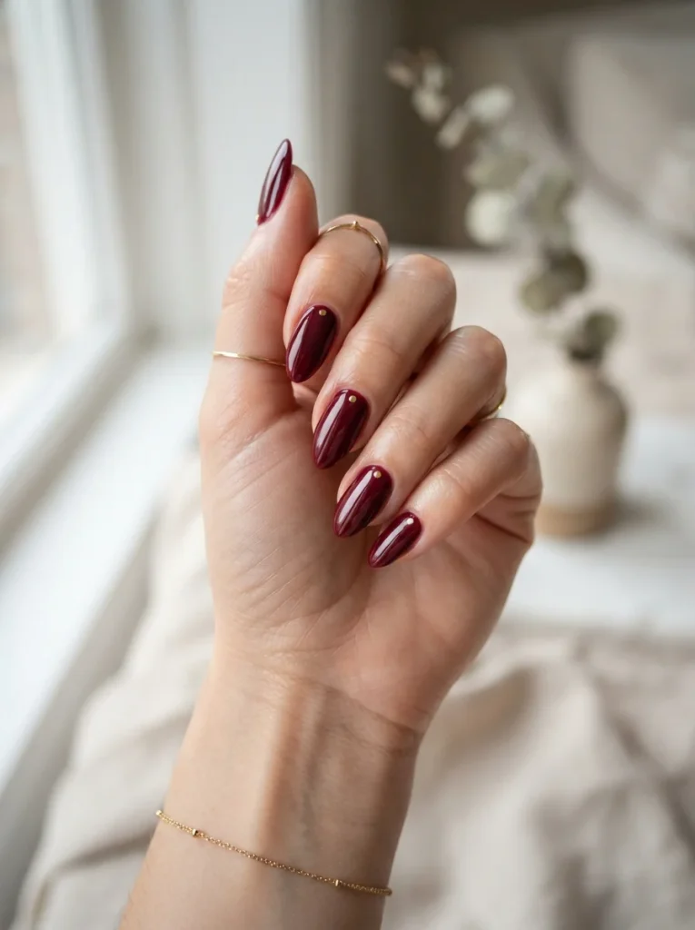 Deep Wine with a Glossy Finish Fall Almond Nails