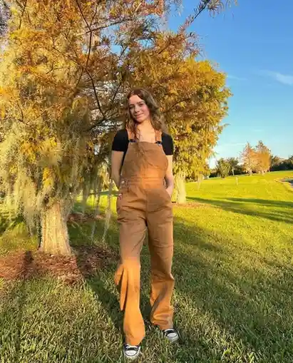 Cute, Cozy, and Photo-Ready: 13 Fall Outfits Pumpkin Patch Days Deserve 5 Denim Overalls With a Burnt Orange Tee