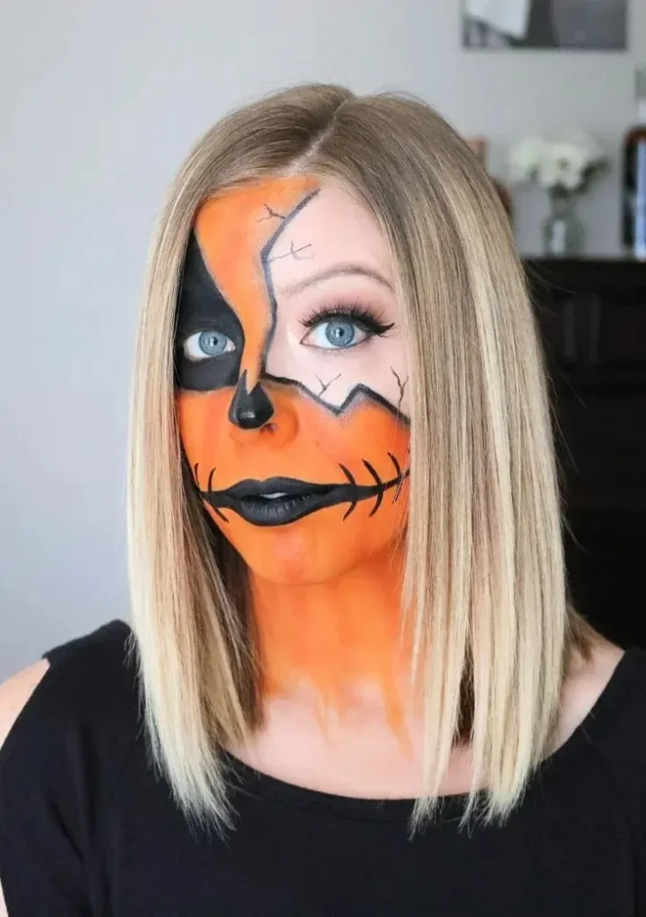 16 Halloween Makeup Looks That Turn a Simple Outfit Into a Whole Costume 2 Half Pumpkin Face