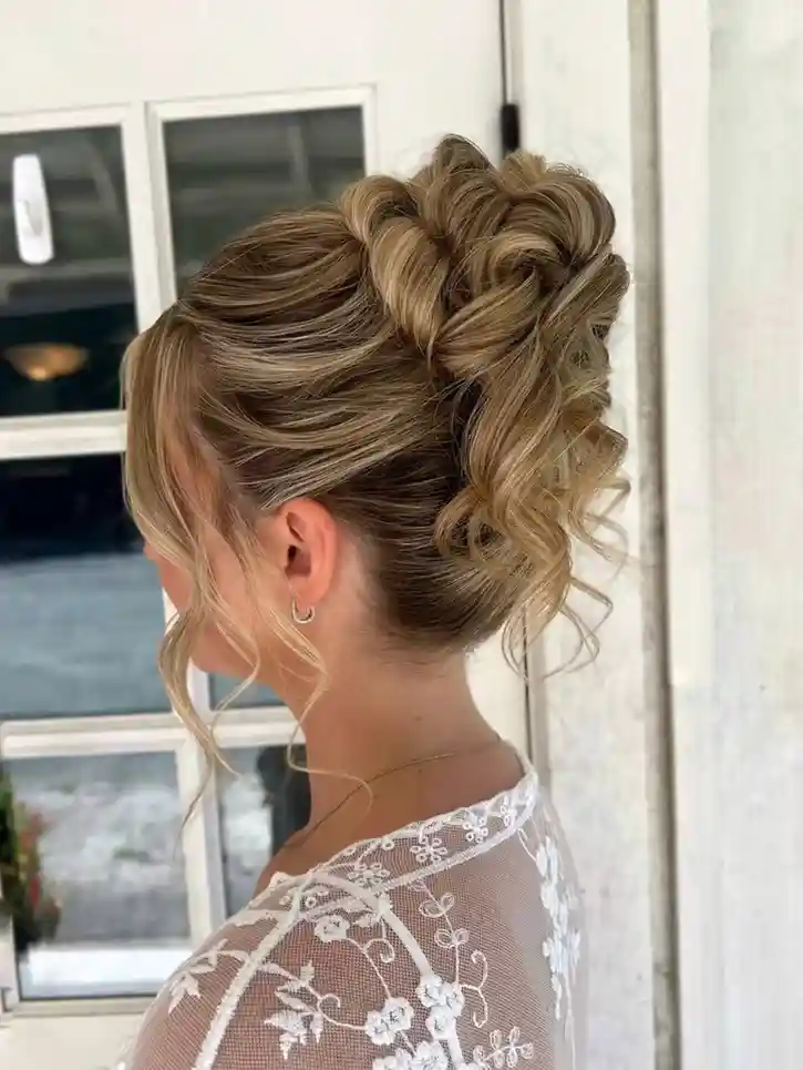 Your Wedding Look Just Got Easier: 16 Simple Wedding Hairstyles That Feel Effortlessly Beautiful 14 High Soft Bun