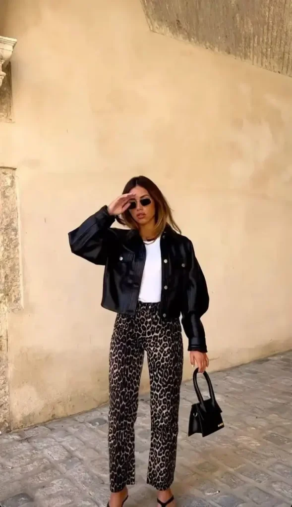 One Jacket, So Many Moods: 15 Leather Jacket Fall Outfits 4 Leather Shirt Jacket With Printed Jeans