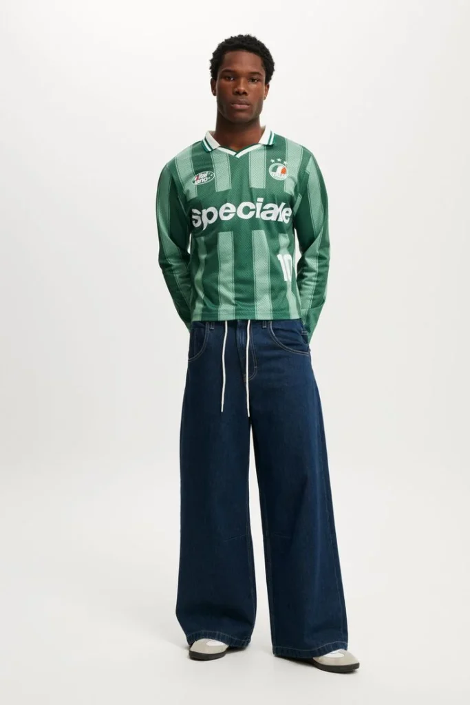 Cooler Weather, Sharper Fits: 13 Men Streetwear Fall Outfits 7 Long Sleeve Football Jersey With Dark Denim