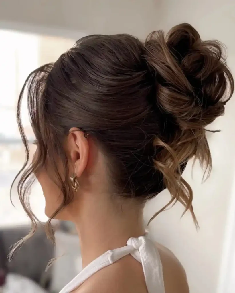 Your Wedding Look Just Got Easier: 16 Simple Wedding Hairstyles That Feel Effortlessly Beautiful 11 Low Bun With Face Framing Pieces 1