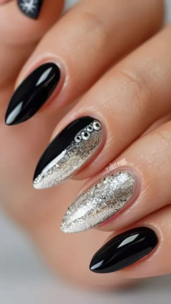 Dark, Festive, and Seriously Chic: 16 Black Christmas Nails for a Stylish Holiday Look 4 Matte Black and Silver Glitter Nails