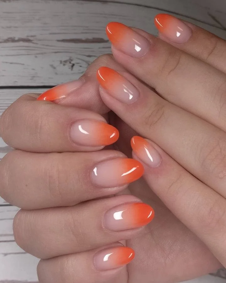 13 Fall Orange Nails That Make Autumn Feel Extra Cozy 12 Milky Nude Nails With Orange Tips