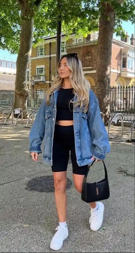 The Denim Layer You’ll Keep Reaching For: 14 Jean Jacket Outfits Fall Is Made For 4 Oversized Denim Jacket With Bike Shorts
