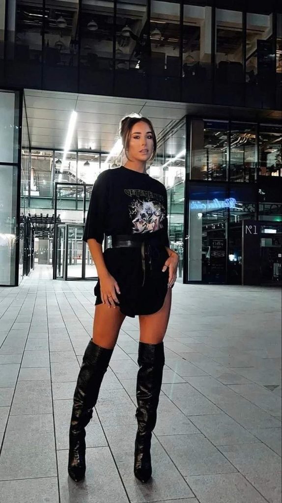 Cold Weather, Main Character Energy: 13 Baddie Fall Outfits 7 Oversized Graphic Jersey With Thigh High Boots