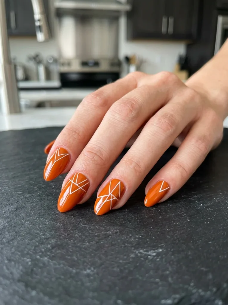 16 Cute Fall Nails That Will Make Your Autumn Manicure Look Cozy and Trendy 6 Pumpkin Spice Orange With a Twist