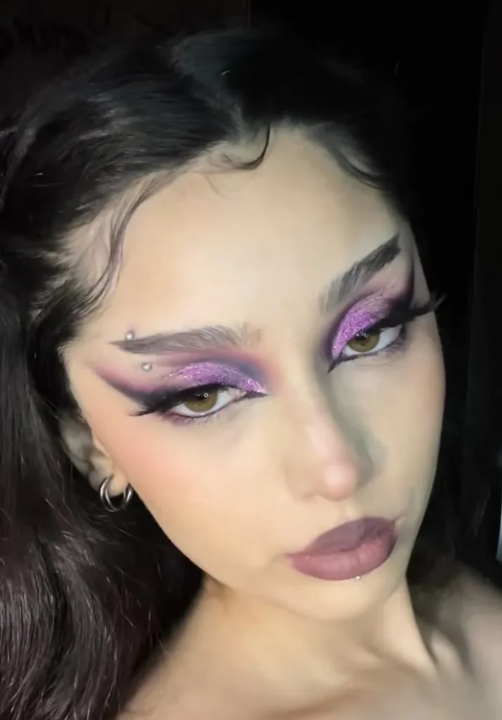 16 Halloween Makeup Looks That Turn a Simple Outfit Into a Whole Costume 7 Purple Bat Wing Eyes