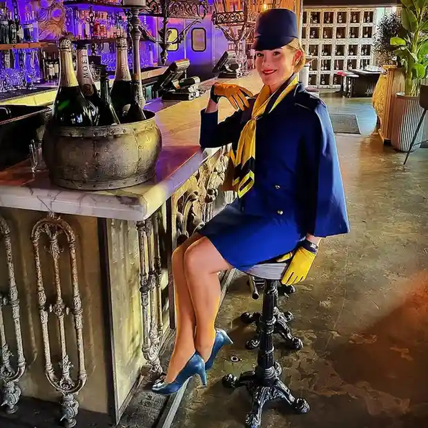 Your Halloween Look Starts Here: 15 Halloween Costume Ideas With Serious Style 11 Retro Flight Attendant