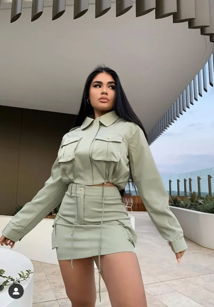 Cold Weather, Main Character Energy: 13 Baddie Fall Outfits 10 Sheer Logo Top With a Utility Mini Skirt