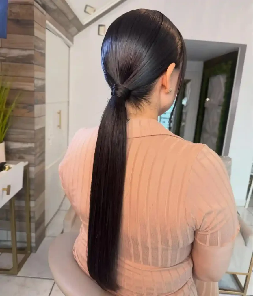 Your Wedding Look Just Got Easier: 16 Simple Wedding Hairstyles That Feel Effortlessly Beautiful 4 Sleek Low Ponytail