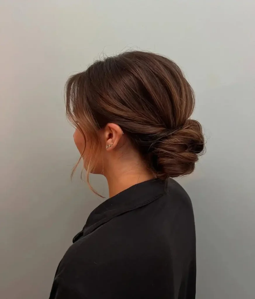 Your Wedding Look Just Got Easier: 16 Simple Wedding Hairstyles That Feel Effortlessly Beautiful 1 Soft Low Bun